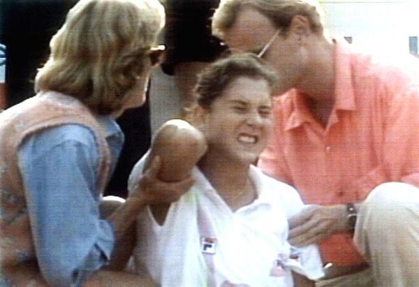 This handout picture released by German TV Public Broadcaster ARD/NDR shows medical doctors take care of Serbo-Croatian tennis player Monica Seles, injured by a knife attack on April 30, 1993 on the Rothenbaum tennis court in Hamburg, northern Germany