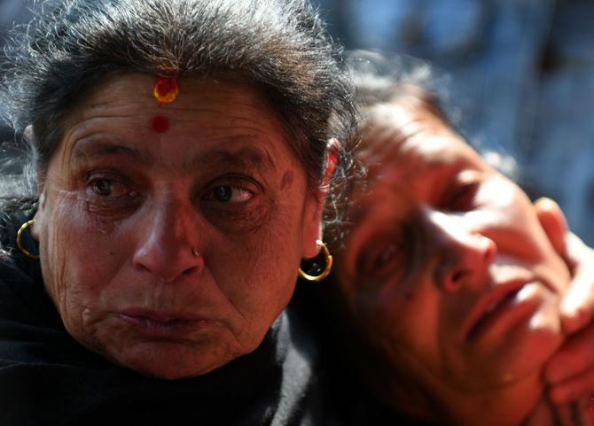 Family members of the plane crash victims spotted outside a morgue at the Teaching Hospital in Kathmandu. Pic/AFP