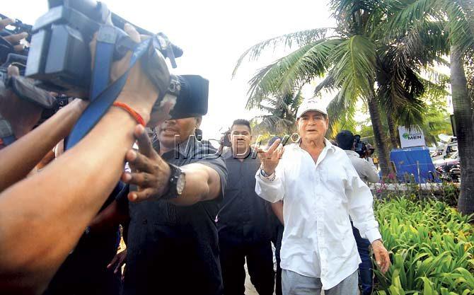 7.45 am: Salman Khanu00e2u0080u0099s father Salim was seen gesturing to some questions at camera persons outside Galaxy in Bandra, the family residence. Pic/Sameer Markande