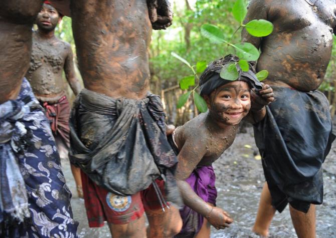 The Mebuug-buugan is a mud bath ritual that is popular mainly in the rural areas of Bali, Indonesia. All pics/AFP