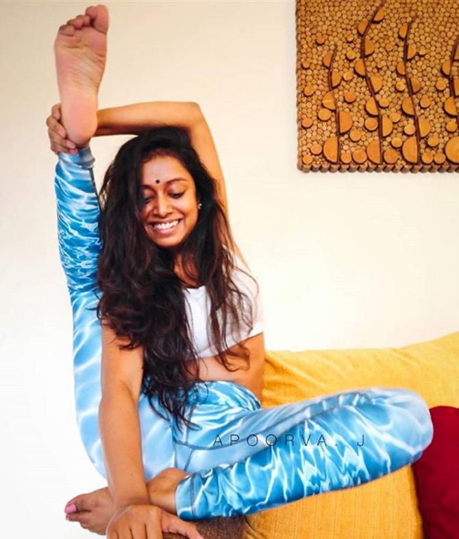 Apoorva Jayarajan: Lookin' like a fine piece of human jalebi. I'm balancing on the armrest with a pair of slippery pants on like my life depends on it, just saying.&eth, So if you're going to be attempting this for the first time, like I am here, please use your common sense and do it on the floor, on a mat preferably