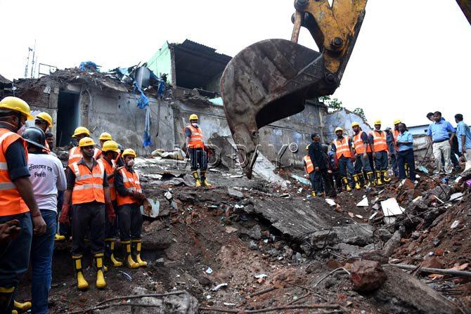 Sniffer dogs and four earthmovers were deployed to search for the missing