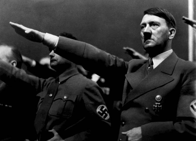 A picture dated 1939 shows German Nazi Chancellor Adolf Hitler giving the nazi salute during a rally next to 'Deputy Furhrer' Rudolf Hess.