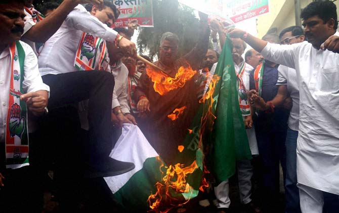 Congress activists protest against attack on Indian amry camp in Uri in Jammy and Kashmir, in Thane Congress activists protest against attack on Indian amry camp in Uri in Jammy and Kashmir, in Thane