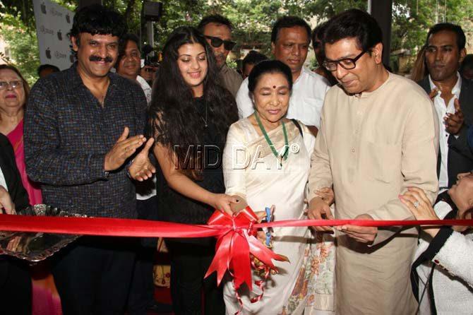 Asha Bhonsale cuts the ribbon