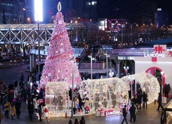 This beautifully decorated Christmas tree is displayed outside a shopping mall in Beijing, China