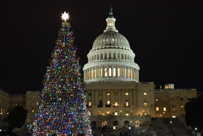 The Capitol Christmas tree is lit during a ceremony on the West Front of the US Capitol in Washington, DC. The Engelmann Spruce from the Kootenai National Forest in Montana will be lit from nightfall to 11 p.m. through January 1, 2018