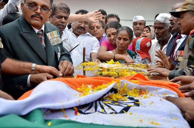 Family members paying tribute to Lance Naik Chandrakant Shankar Galande