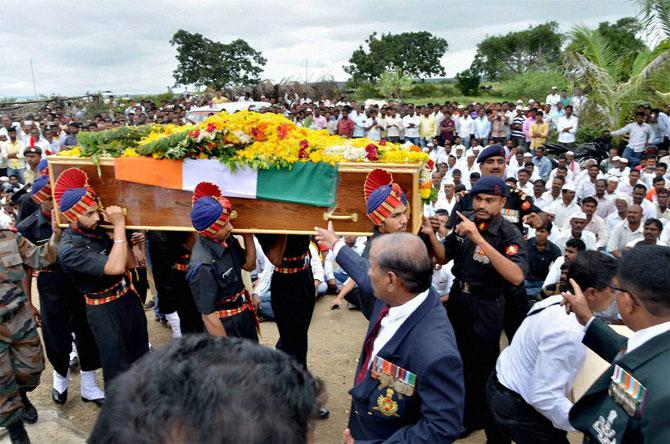 Army jawans carry the coffin of Lance Naik Chandrakant Shankar Galande