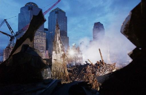 Early morning light illuminates the wreckage of the World Trade Center on September 25, 2001, in New York. Search and rescue efforts continue in the aftermath of the 11 September terrorist attack.