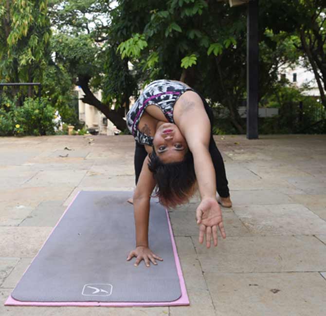 Dolly Singh's fan following is because she promoted body positivity by showing that size is no barrier to mastering complex yoga moves. Pic/AFP