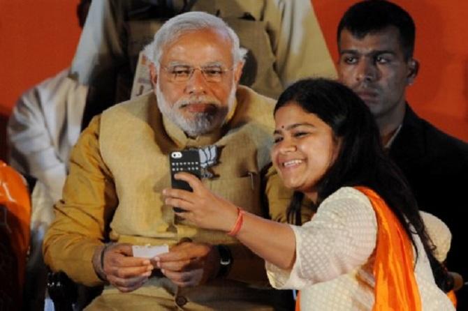 After BJP's impressive show in the second phase of the Maharashtra civic polls for civic bodies in Pune and Latur districts, BJP chief Amit Shah on Thursday appointed Poonam Mahajan the head of party's youth wing Bhartiya Janata Yuva Morcha In picture: With Prime Minister Narendra Modi