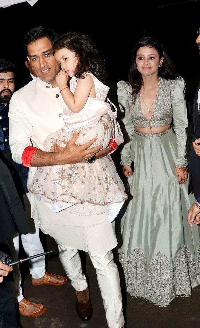 MS Dhoni along with wife Sakshi Dhoni and daughter Ziva attended Poorna Patel's wedding reception with Namit Soni in Mumbai