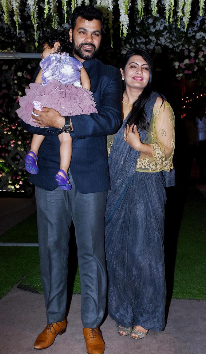 Indian cricketer RP Singh with his wife Devanshi Popat and daughter attended Poorna Patel's wedding reception with Namit Soni in Mumbai