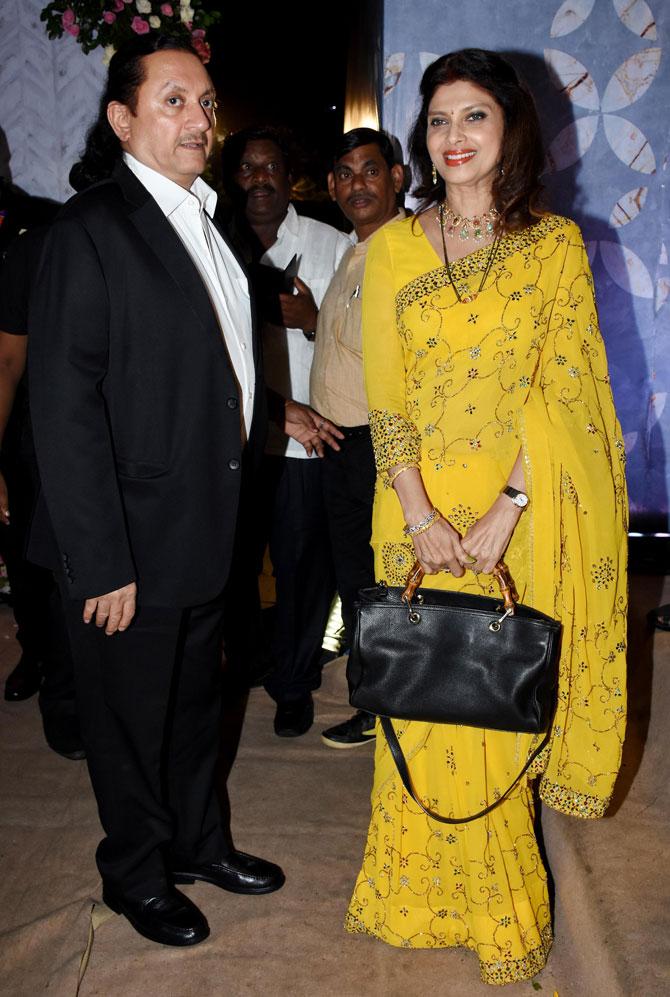 Varsha Usgaonkar made a rare appearance with husband Ajay Sharma at Poorna Patel's wedding reception with Namit Soni in Mumbai