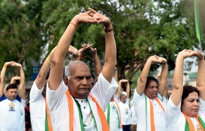 President of India, Ram Nath Kovind, shows off his Yoga skills at a public event. 