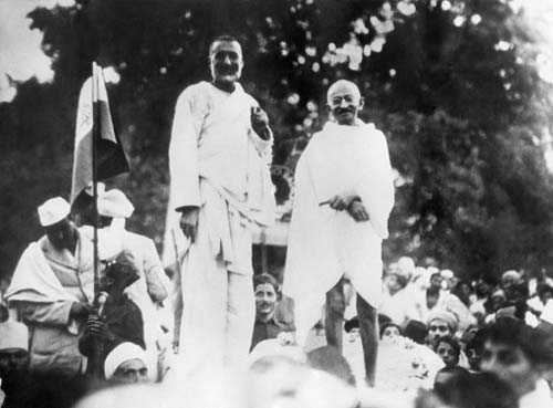 Mahatma Gandhi poses with Pashtun political and spiritual leader Khan Abdul Ghaffar Khan, May 17, 1938, in Peshawar, during a political meeting. The two men were known for their non-violent opposition to British rule during the final years of the Imperial rule in the Indian sub-continent. Khan Abdul Ghaffar Khan was known as Badshah Khan or Frontier Gandhi.