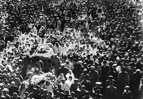 While walking to a prayer meeting in New Delhi on the evening of January 30, 1948, Mahatma Gandhi was shot three times at close range by Nathuram Godse who blamed Gandhi for going along with the 1947 plan that partitioned British India along religious lines. In picture: A huge crowd at the funeral procession of the Mahatma after he was assassinated.