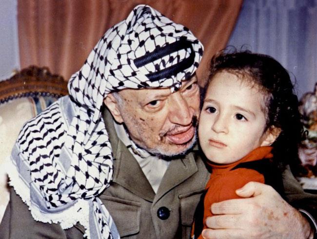In this picture from the Palestinian Authority's archives, dated mid 1990s, Yasser Arafat is seen posing with his daughter Zahwa in Gaza City