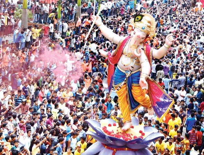 HE, ABOVE ALL: Final adjustments are made as the journey begins for the September 17 festival. Pic/Rane Ashish HE, ABOVE ALL: Final adjustments are made as the journey begins for the September 17 festival. Pic/Rane Ashish