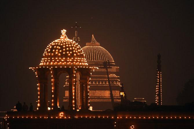 Indian government are seen lit up by lights after the Beating Retreat ceremony in New Delhi. The ceremony is a culmination of Republic Day celebrations and dates back to the days when troops disengaged themselves from battle at sunset. Pic/AFP