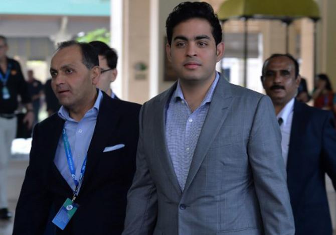 Change in eating habits and cardiovascular training helped Akash Ambani reduce his weight drastically. Pic/AFP