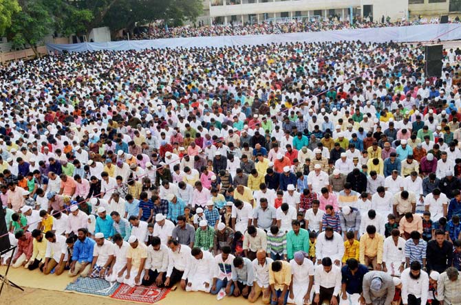 Muslims offering namaz on the occasion of Eid al-Adha festival in Coimbatore on Tuesday. Pic/PTI 