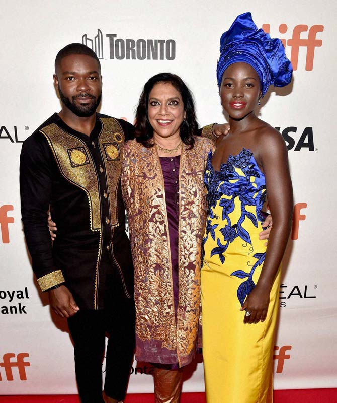 (Left to Right) Actor David Oyelowo, director Mira Nair and actress Lupita Nyong'o arrive at the world premiere of Disneyu00c3u00a2u00c2u0080u00c2u0099s u00c3u00a2u00c2u0080u00c2u009cQueen of Katweu00c3u00a2u00c2u0080u00c2u009d at Roy Thompson Hall as part of the 2016 Toronto Film Festival. Pic/PTI