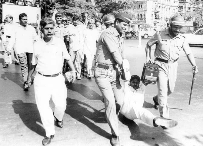 Apart from that, there were strikes based on communities, castes, and workplaces. A man being dragged by policemen during Rasta Roko at Bandstand near Girgaum Chowpatty in February 1996.