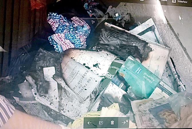 It was reported that Dhara was her ex-boyfriend. According to cops, Dhara confessed to the murder, and said he was jealous of her friendships with other men and did not like her going out (In pic: Burnt books in Shraddha's bedroom)