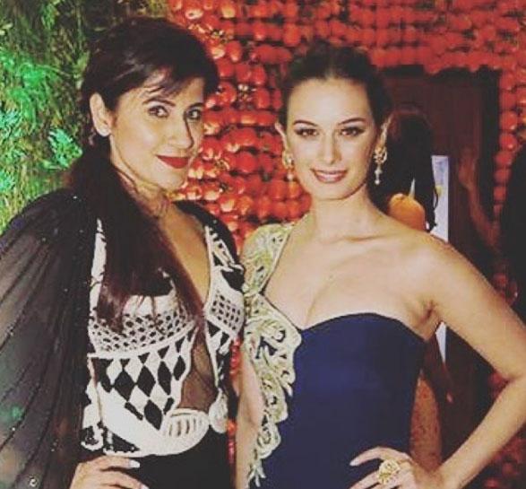 Pilates is a system of exercises using special apparatus, designed to improve physical strength, flexibility and posture, and enhance mental awareness. In picture: Yasmin Karachiwala with Evelyn Sharma