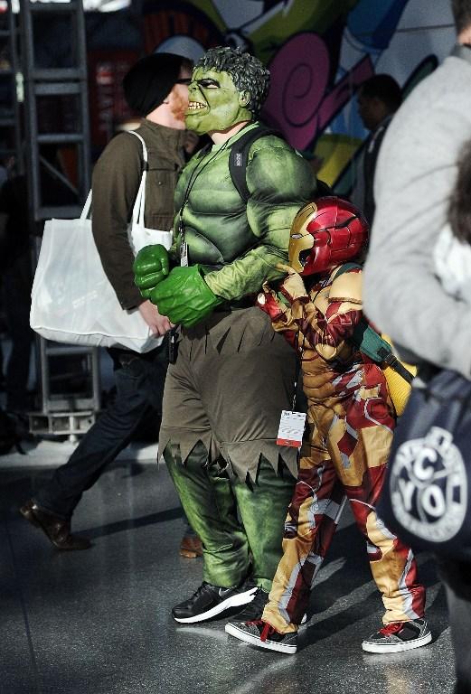 Attendees dressed as The Hulk and Iron Man