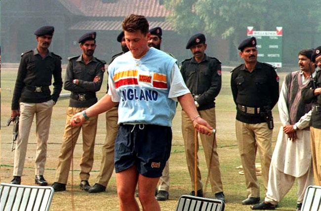 Jump start: Darren Gough skips at net practice, watched by Pakistan security forces, during England squad's preparation for the 1996 Cricket World Cup in Lahore, Pakistan