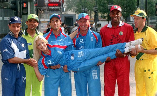 Uplifting! Super-model Caprice gets a lift from six cricketers (L-R) George Salmond (Scotland), Saqlain Mushtaq (Pakistan), Adam Hollioake (England), Alec Stewart (England), Franklyn Rose (West Indies) and Stuart Law (Australia) during an event to promote the 1999 Cricket World Cup, in London on September 24, 1998