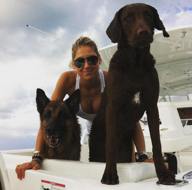 Anna Kournikova loves dogs. These are her two pets