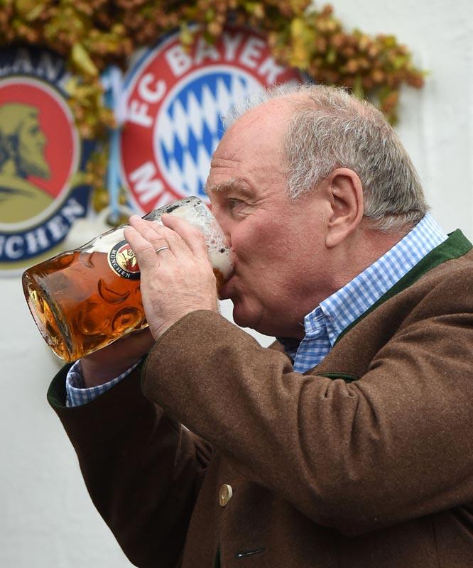 Former President of FC Bayern Munich Uli Hoeness drinks beer.