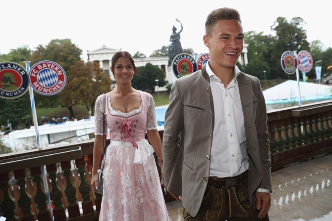 Bayern Munich's midfielder Joshua Kimmich and Lina.