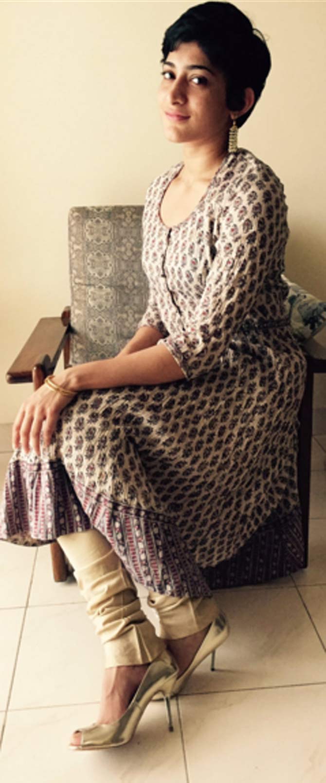 Ashwini Ponnappa rocks this long kuriti chudidaar, heels and ear-rings with ease