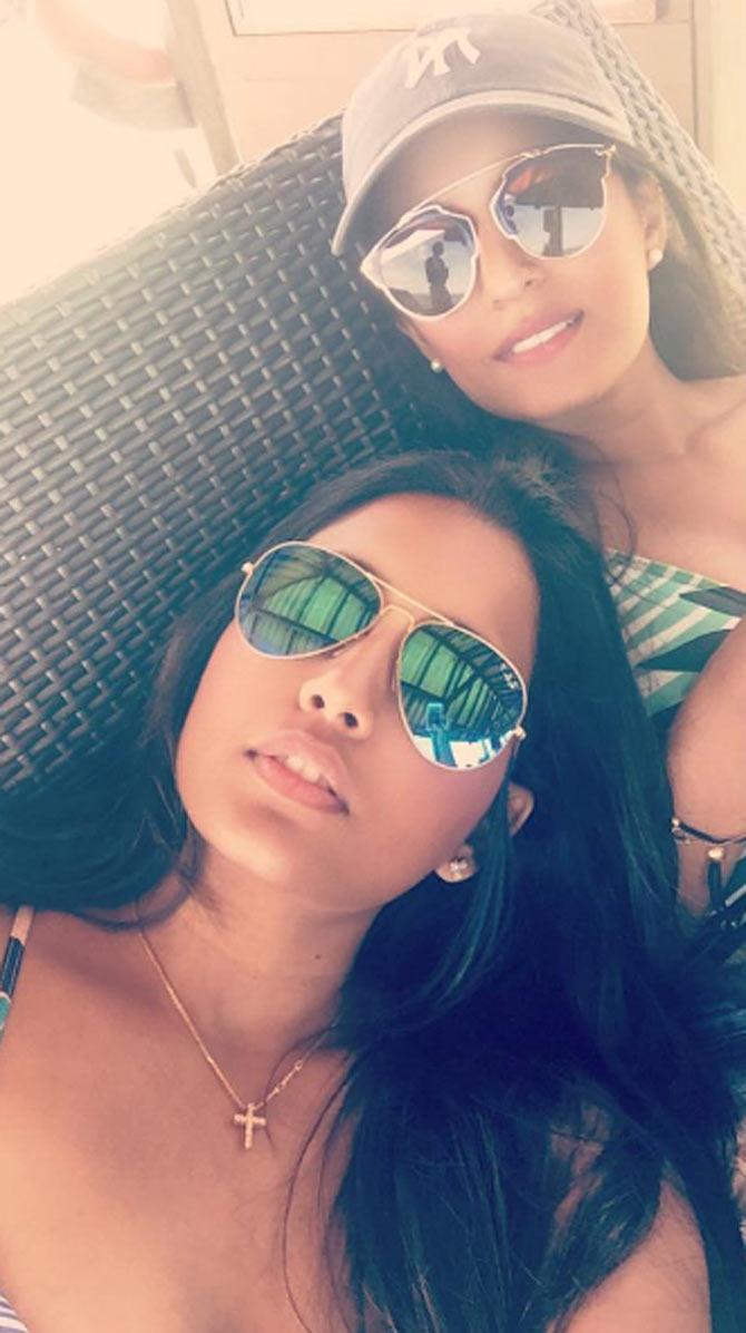 In picture: Dipika Pallikal in a cool pose with her friend during a holiday