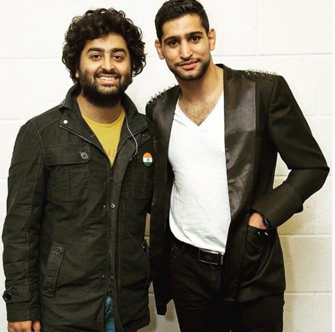 In picture: Amir Khan with singer Arijit Singh.