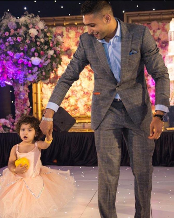 In picture: Amir Khan can't get enough of his cute daughter Lamaisah.