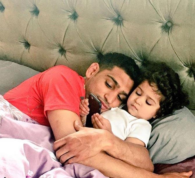 On May 23, 2014, Amir Khan and Faryal welcomed their first child - a girl named Lamaisah. In picture: Amir Khan with daughter Lamaisah when she turned 2.