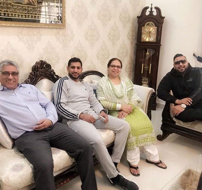 In picture: Amir Khan with his family at his residence in UK.