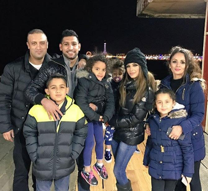 In picture: Amir Khan enjoying a 'good time' with family and friends in Blackpool.