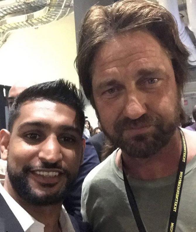 In picture: Amir Khan with Hollywood action star Gerard Butler.