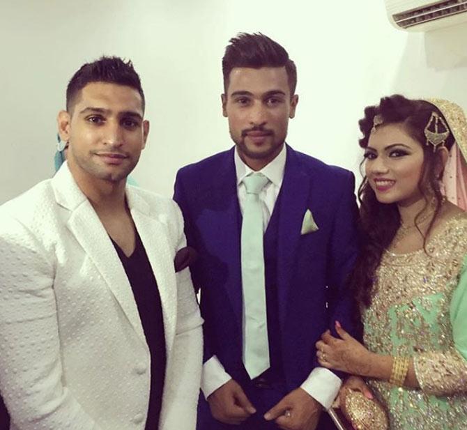 In picture: Amir Khan with Pakistan cricketer Mohammad Amir and his wife on their wedding day.