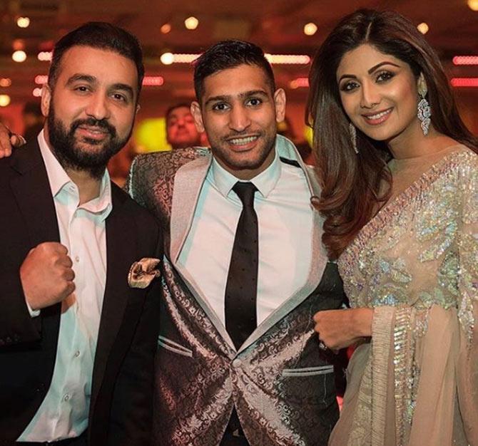 In picture: Amir Khan with Shilpa Shetty Kundra and Raj Kundra at a charity concert.