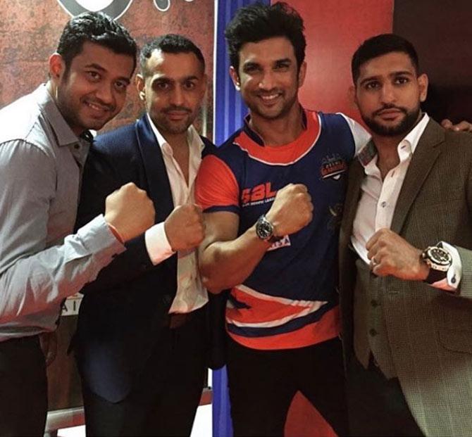 In picture: Amir Khan with the late Sushant Singh Rajput at Super Boxing League.