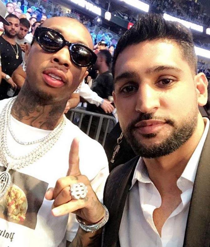 In picture: Amir Khan with US rapper Tyga.
