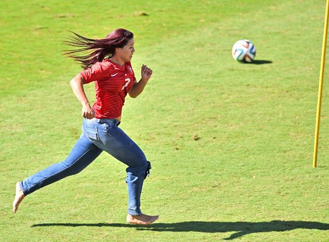 A fan of Portugal's forward Cristiano Ronaldo runs onto the pitch